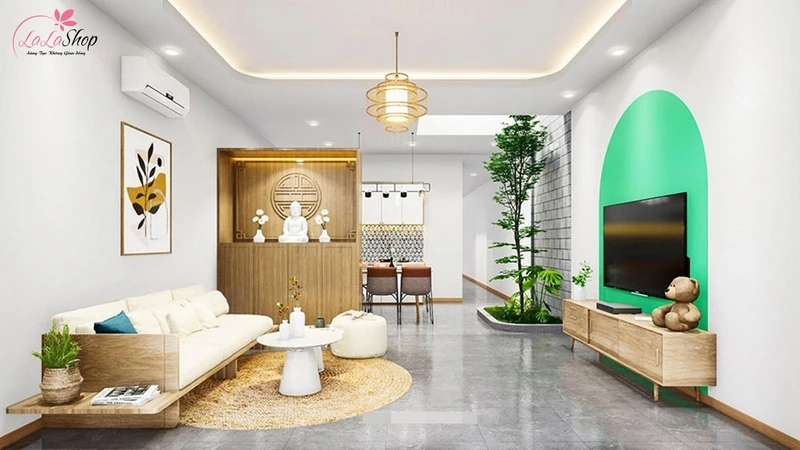 Dán tường xanh lá sau tivi làm tâm điểm cho căn phòng