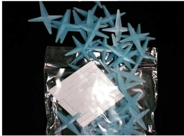 Sao dạ quang 4 cánh bộ 50 cái xanh lá