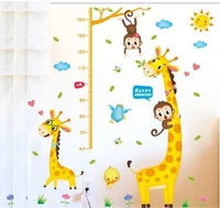 Decal dán tường thước đo hươu vàng và khỉ đu dây 2