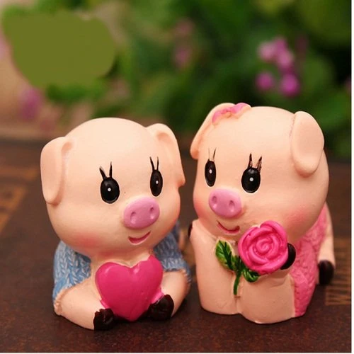 Cặp búp bê heo nằm