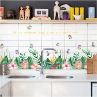 Decal dán tường chân tường lá xanh hoa hồng