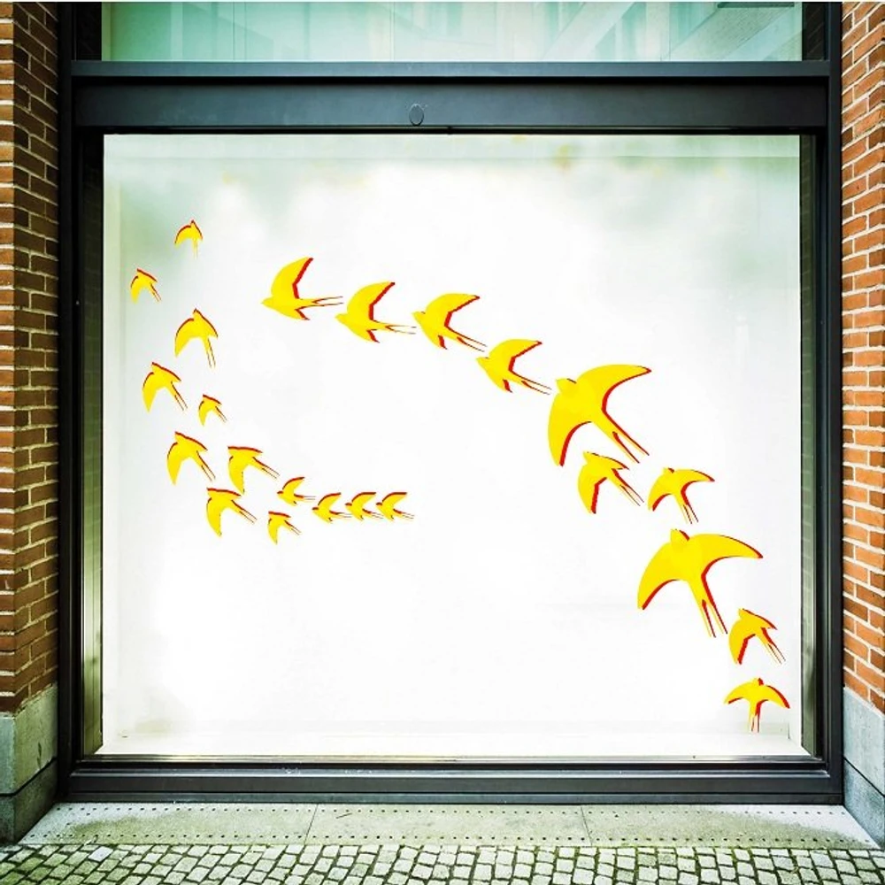 Decal trang trí tết én vàng đón xuân 2