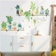 Decal treo tường kệ gỗ và chậu cây xanh