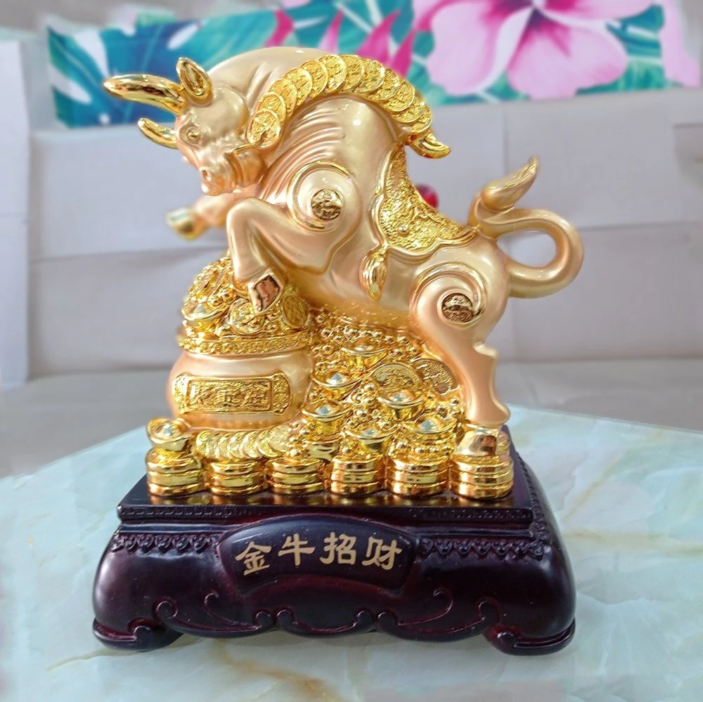 Tượng trâu vàng sung sức ngậm vàng trang trí tết