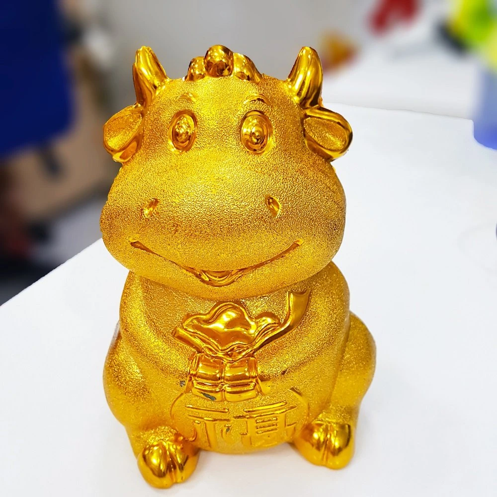 Trâu vàng tiết kiệm trang trí tết