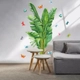 Decal dán tường lá chuối xanh và những chú bướm sắc màu