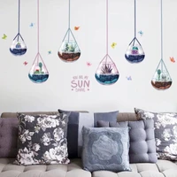Decal dán tường chậu cây thủy tinh dây treo