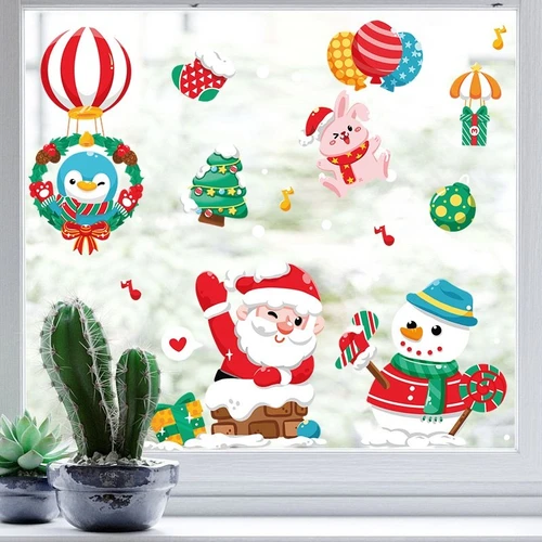 Decal trang trí noel vui đùa dưới trời tuyết