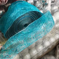 Cuộn ruy băng xanh họa tiết trang trí noel