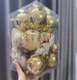 Hộp châu vàng kèm nơ trang trí noel