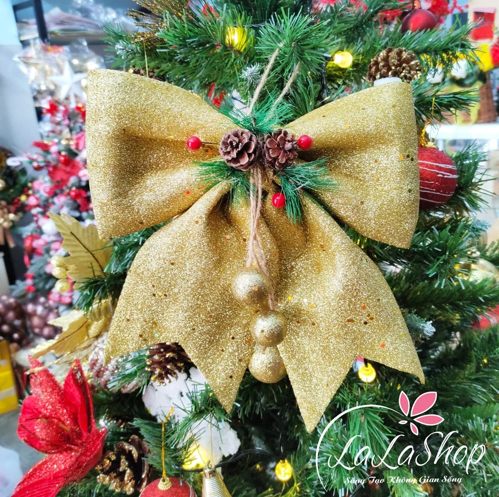 Đồ trang trí noel nơ họa tiết trái thông