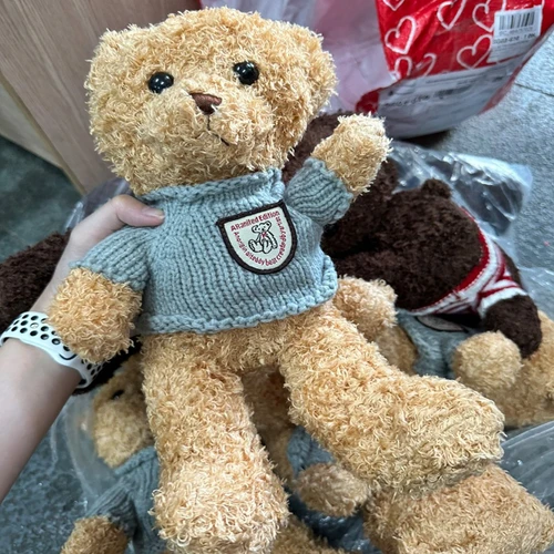 Gấu bông teddy bear lông xù mang áo len đáng yêu