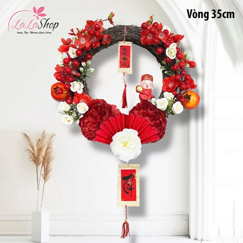 Vòng hoa đào đông thần tài đón tết gia chủ phát tài