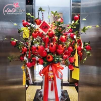 Bình hoa lựu đỏ trang trí tết mang may mắn tài lộc