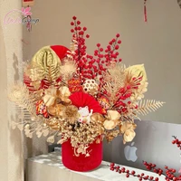 Bình hoa đào đông tài lộc và mèo thần tài