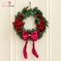 Vòng nguyệt quế Noel 50cm điểm quả cầu nhung đỏ và nơ lớn