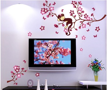 Decal dán tường cành đào và khỉ con