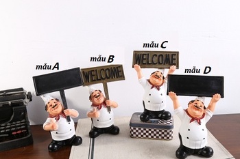 Tượng đầu bếp cầm bảng welcome