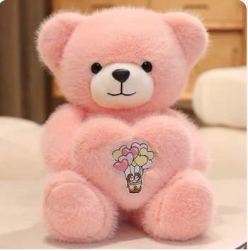 Gấu hồng lông xù ôm trái tim đáng yêu xinh xắn
